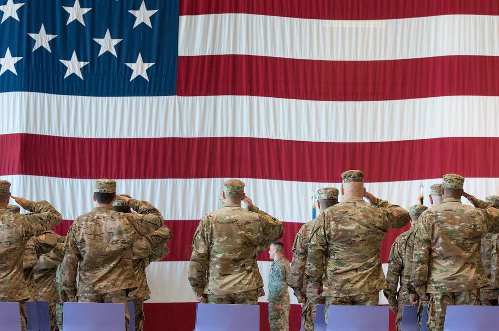 soldiers-salute-the-american-flag-as-the-national-anthem-0e798c-1024-3421807078.jpg